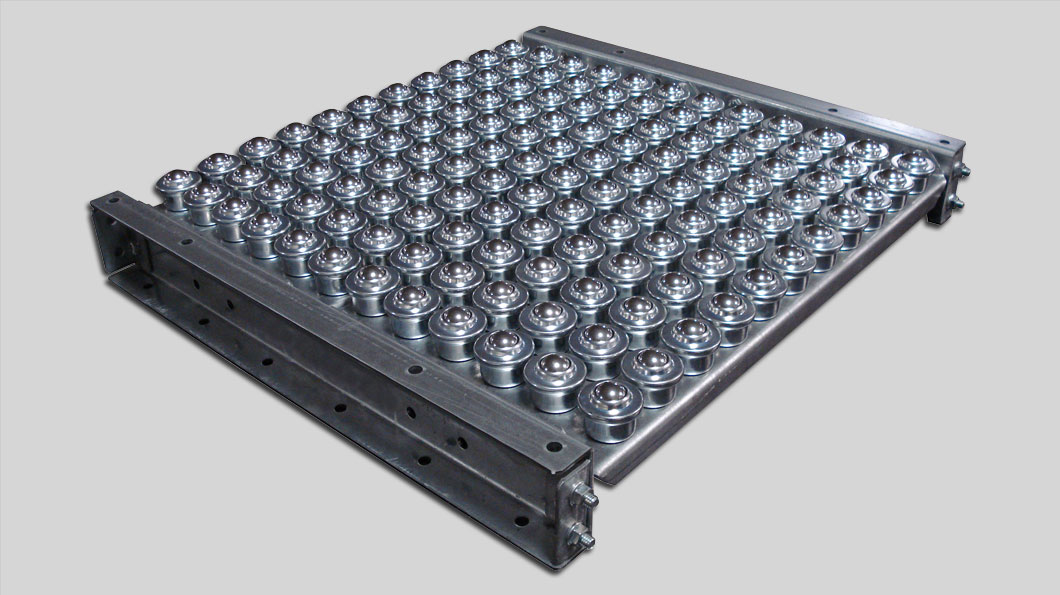 Conveyors de gravedad: aplicaciones industriales y cómo optimizar el flujo de materiales con omni metalcraft ball transfer table Omni Metalcraft rotación reposicionamiento producto estación ensamble
